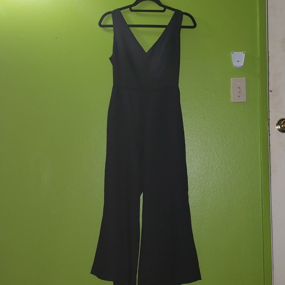 Super elegant but sexy black romper. Great quality